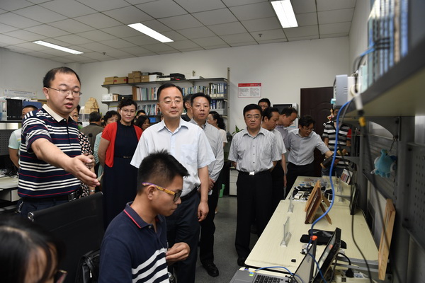 四川省政协党组副书记、副主席高烽一行来校调研