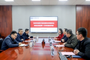 四川省发改委总规划师韩斌来校慰问专家
