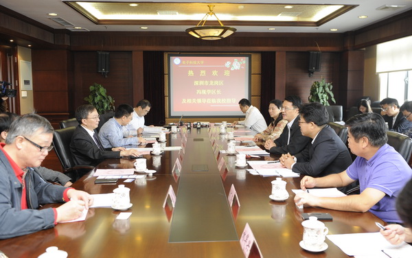 深圳市龙岗区来校洽谈合作