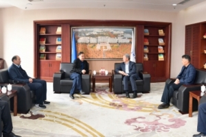 中国兵器工业集团207所所长李定主来校访问