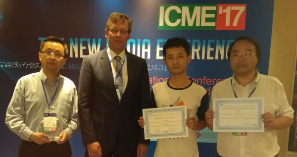 图1 由左至右: 朱策教授, ICME大会主席 Jorn Ostermann教授, 李旭冬, 叶茂教授 图1 由左至右: 朱策教授, ICME大会主席 Jorn Ostermann教授, 李旭冬, 叶茂教授